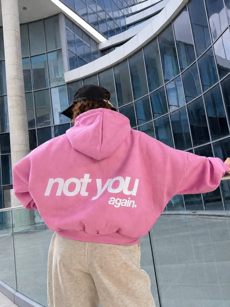 سویشرت زنانه کلاهدار زیپدار با جیب کانگورویی و نوشته Not You در پشت لباس.